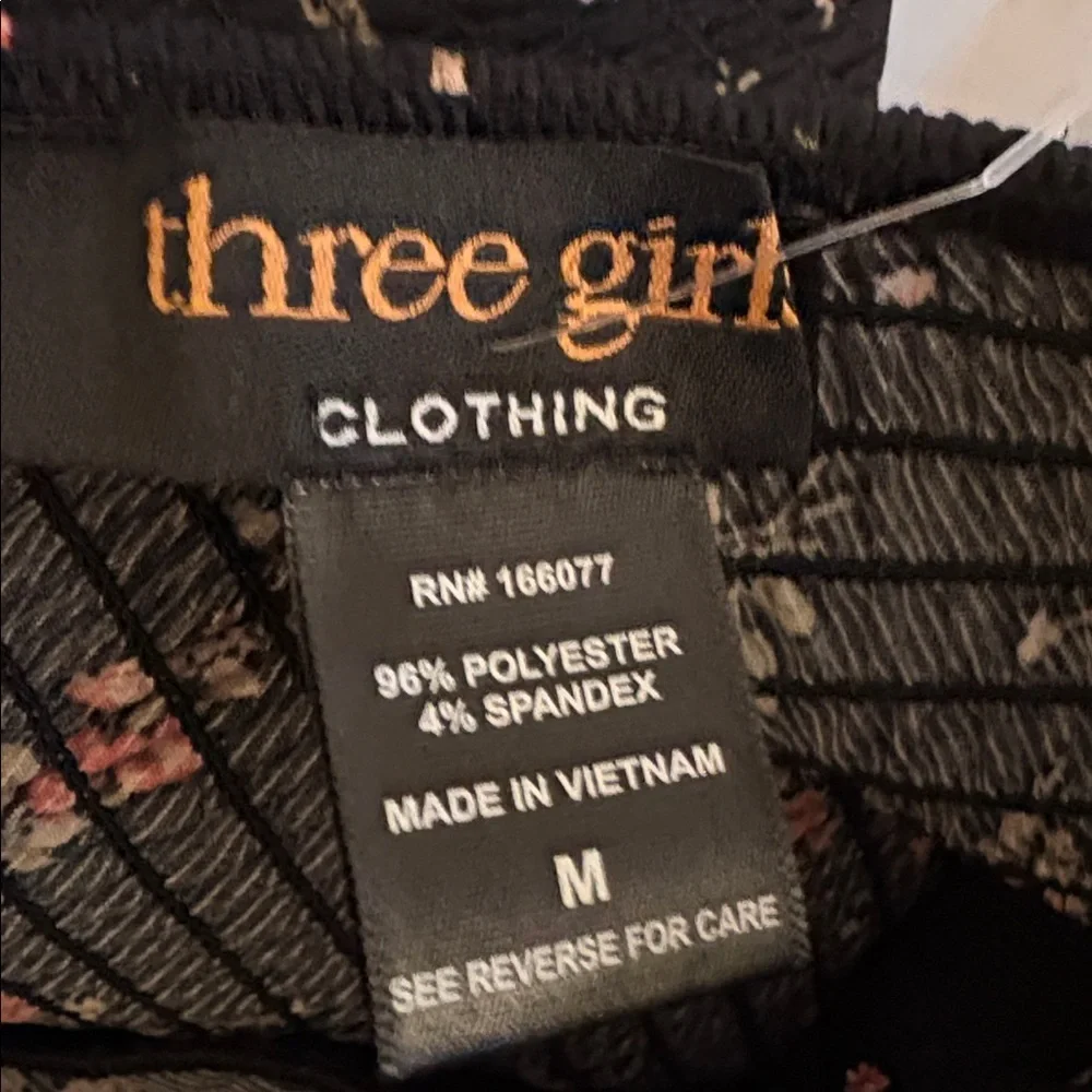 Three Girls Clothing Floral Black Jumpsuit with Ruffle Straps